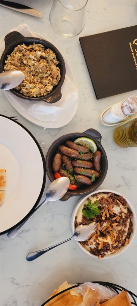 Lebanese dishes on the table at Le Méchoui restaurant in Abidjan