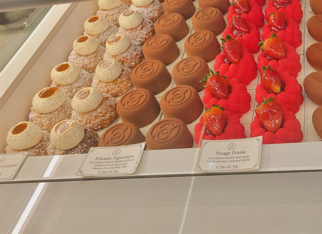 French pastries in the display case at Pikado patisserie in Abidjan
