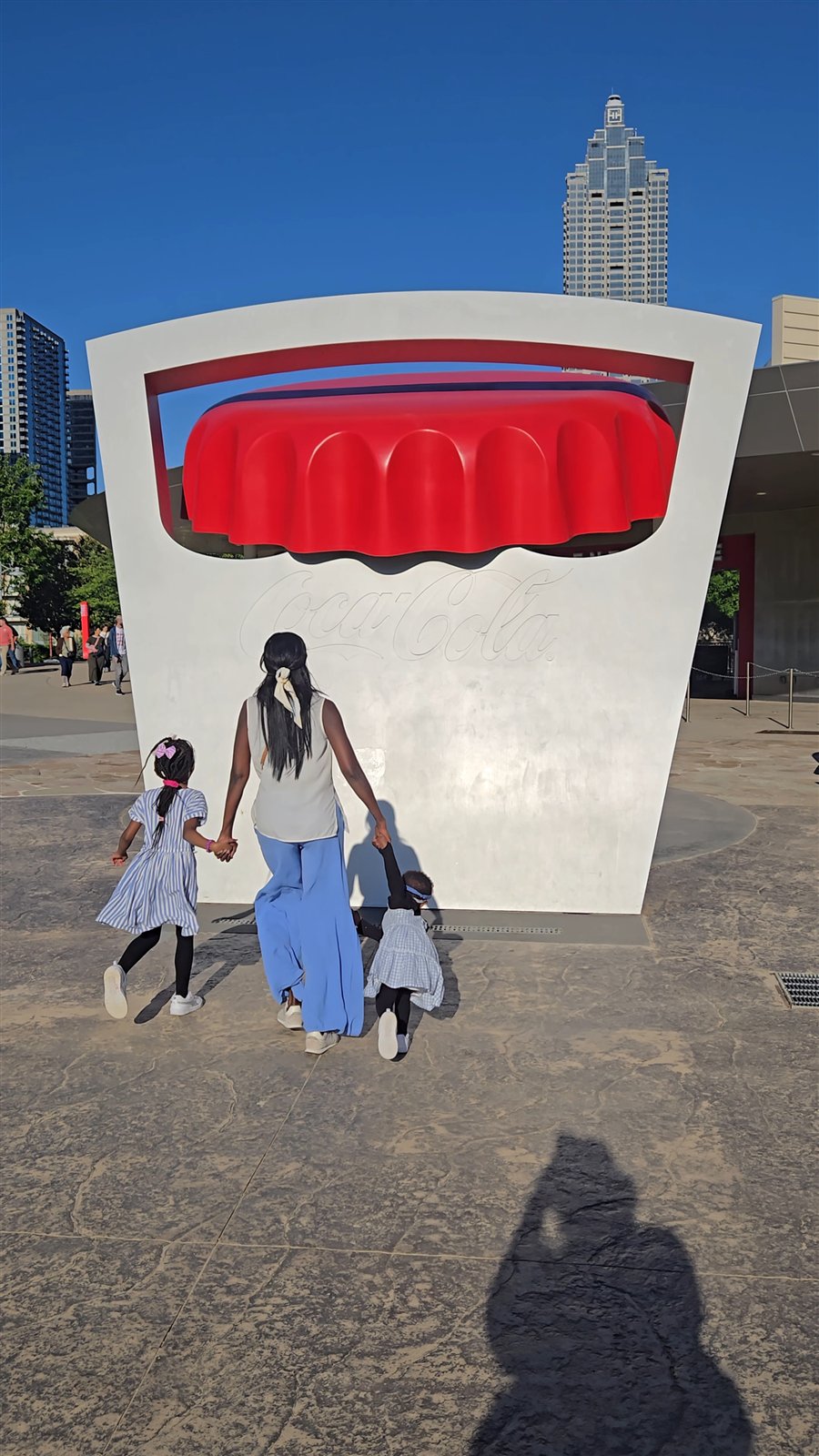 Samira and the kids walking to the World of Coca-Cola in Atlanta