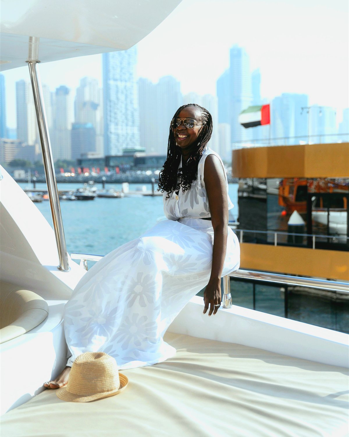 Samira Diallo of Mayana Voyage on a yacht in Dubai Marina